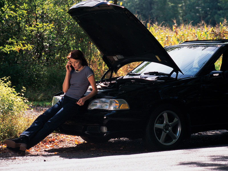 woman calling for auto towing specialists